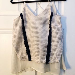 tan top with blue fluff